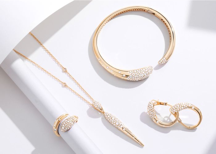 Gold jewelry from Nigaam's Serpens collection.